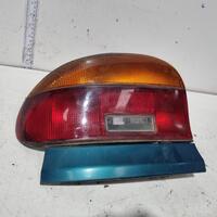 Mazda 121 Left Tail Light DB 12/90-12/97