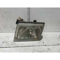 Ford Courier Left Headlight PG/PH LENS# 110-16302 11/2002-11/2006