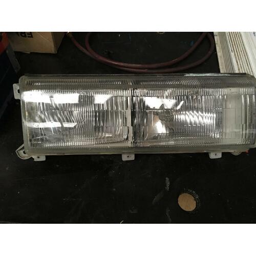 Nissan Nomad Van Right Headlight White Base Koito PH52439 12/86-09/92