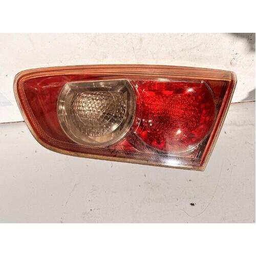 Mitsubishi  LANCER Rear Garnish CJ Right Bootlid 07/07-07/09 Sedan