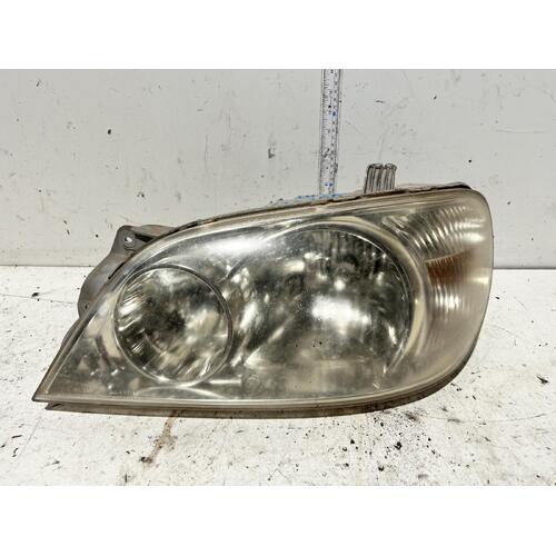 Kia CARNIVAL Left Headlight KV SII 12/01-09/06 