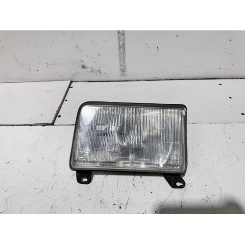 Mazda E Series Left Head Light 08/1999-10/2012