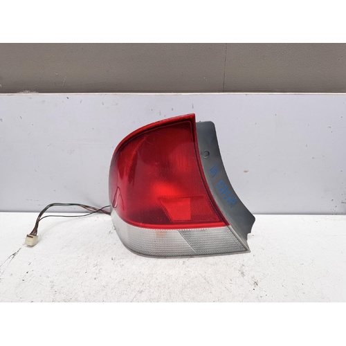 Ford Laser Left Tail Light KN 02/1999-04/2001