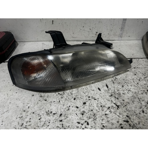 Ford Laser Right Head Light KJ III 12/1996-12/1998