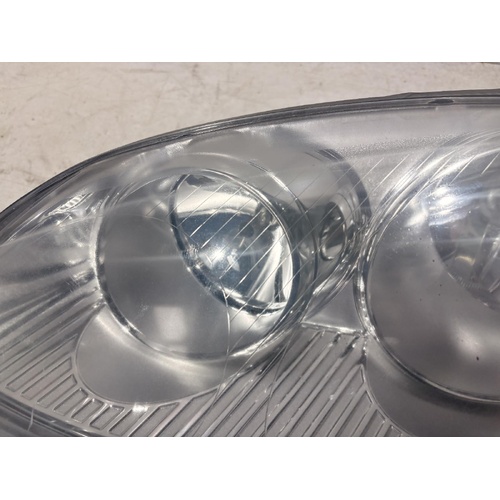 Volkswagen Jetta Left Headlight 1KM 02/2006-07/2011
